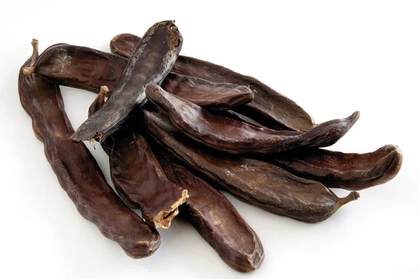 Каробко-коричневі сушені соски як ароматична приправа для хлібобулочних виробів — стокове фото