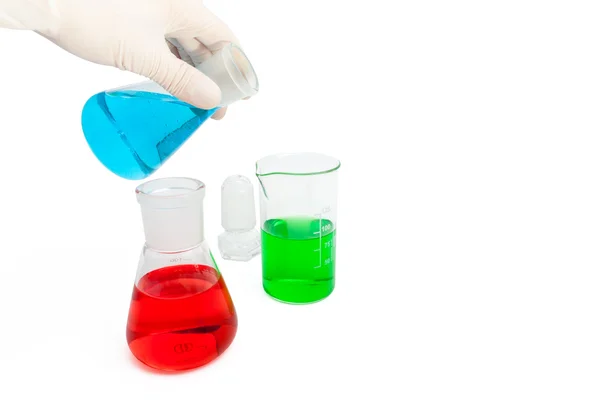 Farblösung in Laborflaschen Stockbild