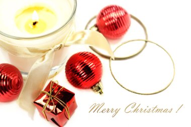 Christmas still life with candle and decorations