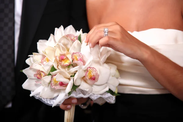 Bride holding a bouquet — Stock Photo, Image