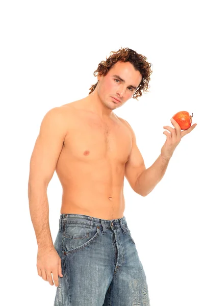 Genç adam bir elma holding — Stok fotoğraf
