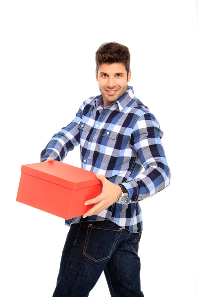 Homem segurando uma caixa — Fotografia de Stock