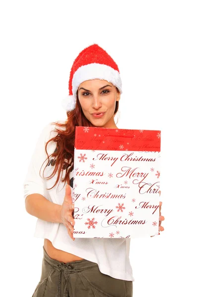 Santa claus girl holding a shopping bag — Stock Photo, Image