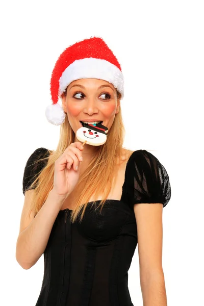 Chica joven con caramelos de Navidad — Foto de Stock