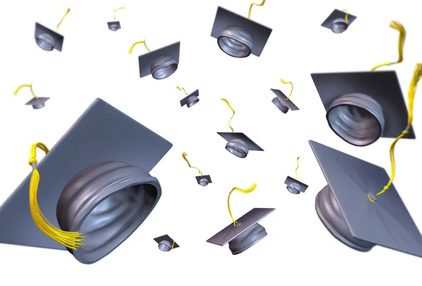 Sombreros de graduación lanzados al aire —  Fotos de Stock
