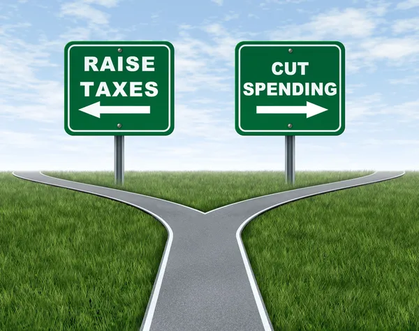 Att höja skatter eller skära ned utgifterna — Stockfoto