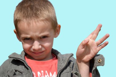 Little boy showing a gesture clipart