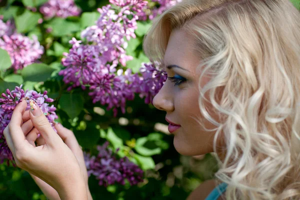 stock image Young blonde woman in the park