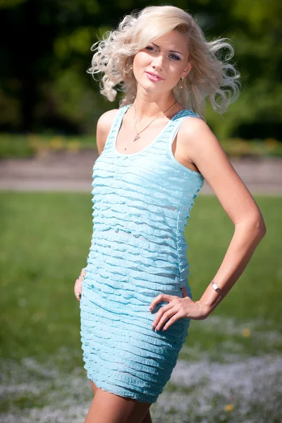 stock image Young blonde woman in the park