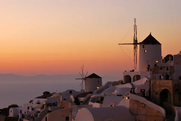 Закат Ии на острове Санторини (Греция) ) — стоковое фото
