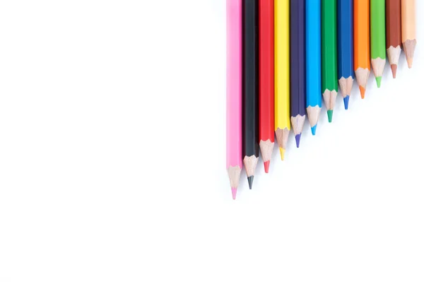 Цветные карандаши в кучу крупным планом — стоковое фото