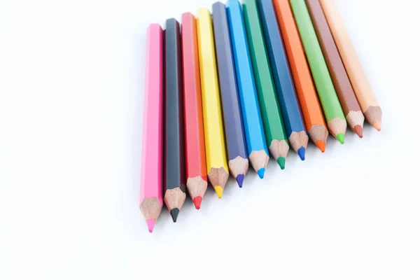 Yakın çekim bir avuç içinde renkli kalemler — Stok fotoğraf