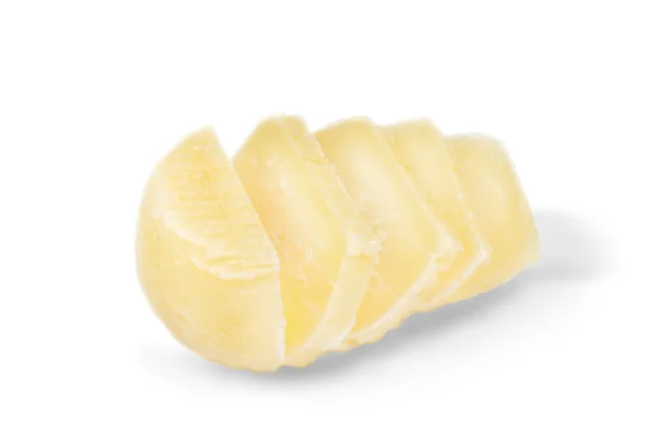 Trozos de queso sobre un fondo blanco —  Fotos de Stock