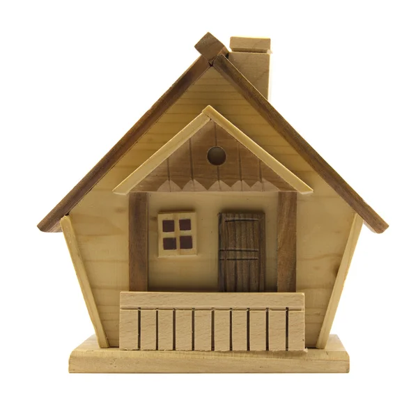 Toy wooden house isolated on white Stock Photo by ©viz-arch 10465025