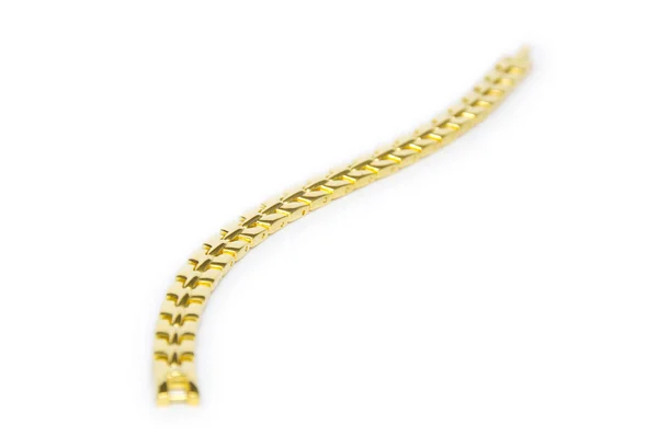 Gold bracelet on white background — Stock Photo, Image