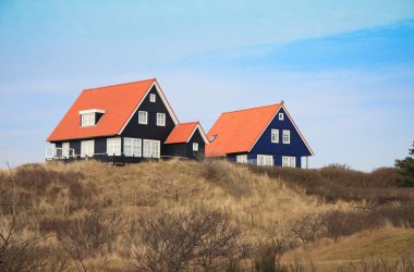 Vacation houses in the island Vlieland in the Netherlands clipart
