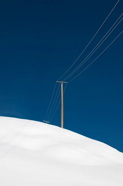 stock image Power pole in winterwonderland