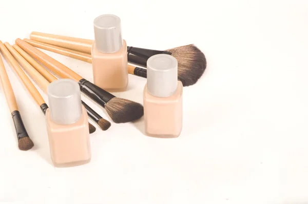 Professional brush and foundation sample on white — Stock Photo, Image