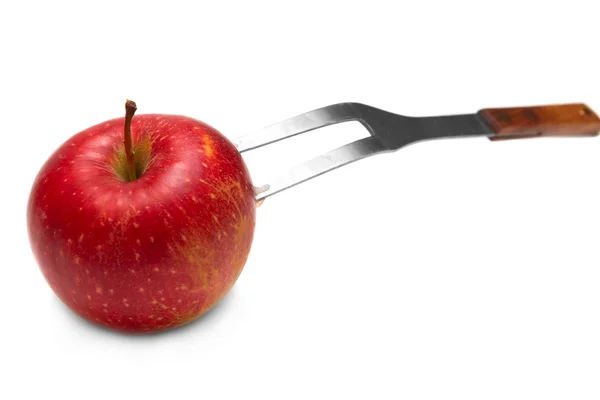 Jabłko na widelec — Zdjęcie stockowe