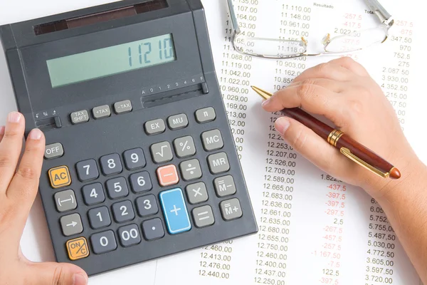 Woman with a calculator — Stock Photo, Image
