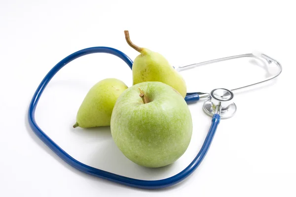 Meyve ve stetoskop — Stok fotoğraf