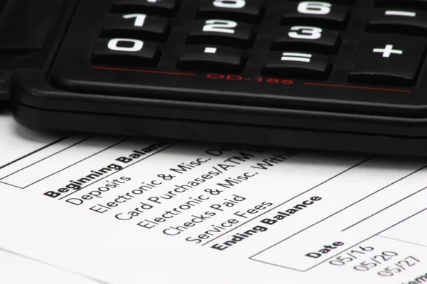 Calculator on Bank Statement — Stock Photo, Image