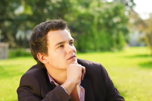 stock image Thinking young man