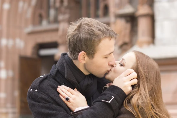 stock image Young couple kissing