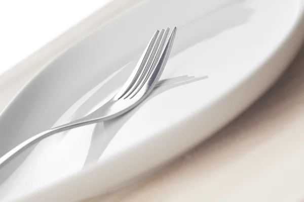 Fork and dish — Stock Photo, Image