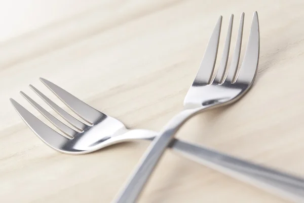 Two crossed forks — Stock Photo, Image