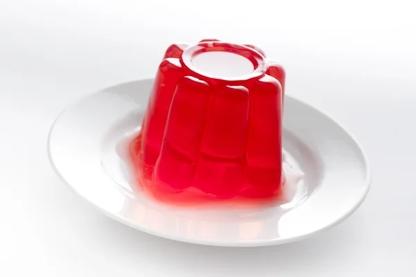 Strawberry gelatin on a dish — Stock Photo, Image