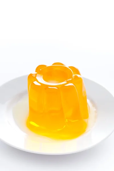 Orange gelatin on a dish — Stock Photo, Image