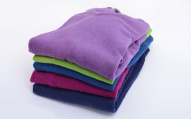 Stack of cashmere sweaters clipart