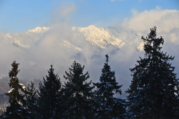 Mountain clouds in winter — Stock Photo, Image