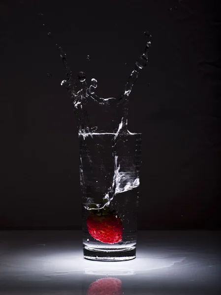 Strawberry into a glass — Stock Photo, Image
