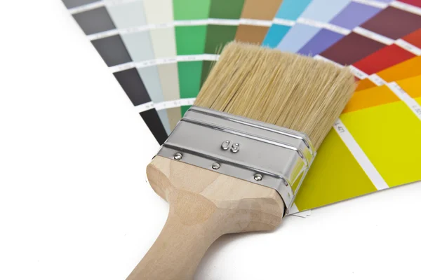 Farbe farbfächer pinsel farbtopf renovieren heimwerker baumarkt Stock Image