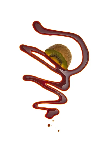 Schokolade flüssig sirup kunst obst Frucht Kiwi — Stockfoto