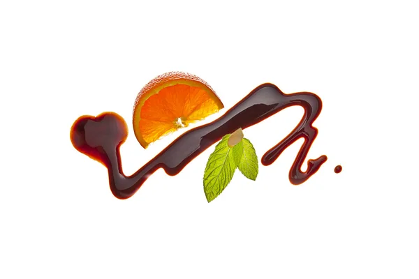 Schokolade sirup kunst frucht obst minze orange — Stockfoto