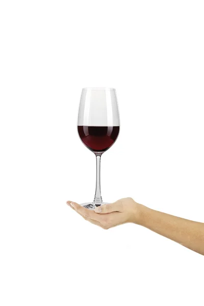 stock image Rotwein Glas auf einer Hand