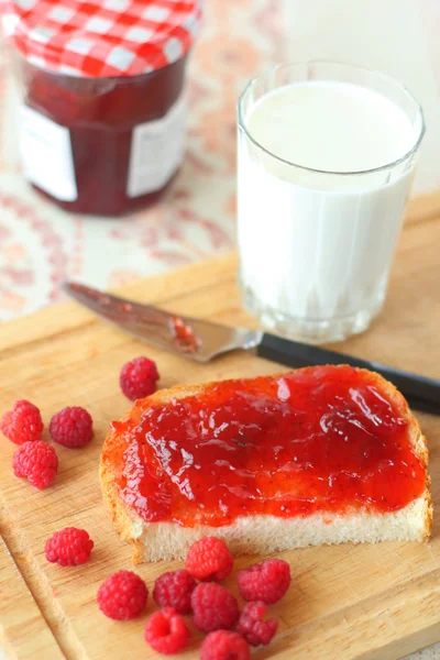 Stock image Bread with jam and a milk glass