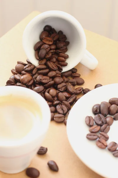 stock image Cup of coffee on a beige background