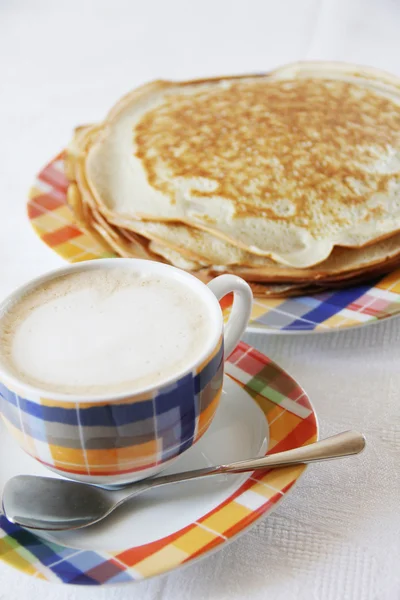 Pancakes and cup of coffee — Stock Photo, Image