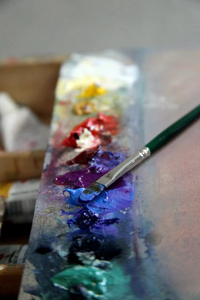 Paints on a palette — Stock Photo, Image