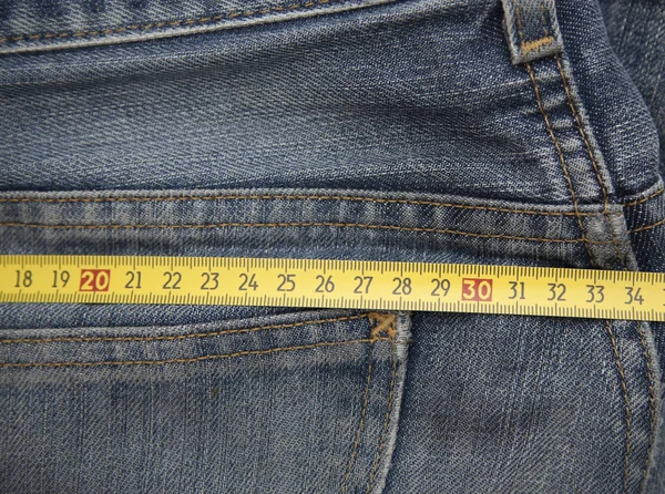 Jeans con Metro — Stock Photo, Image
