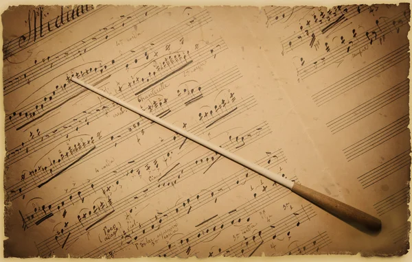 Spartito Musicale con Bacchetta — Fotografia de Stock