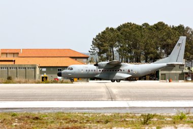 MONTE REAL, PORTUGAL-APRIL 7: EADS CASA C-295 Portuguese taxing. Participat clipart