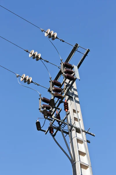 Medium Voltage Pole closeup view under blue sky — Stock Photo, Image