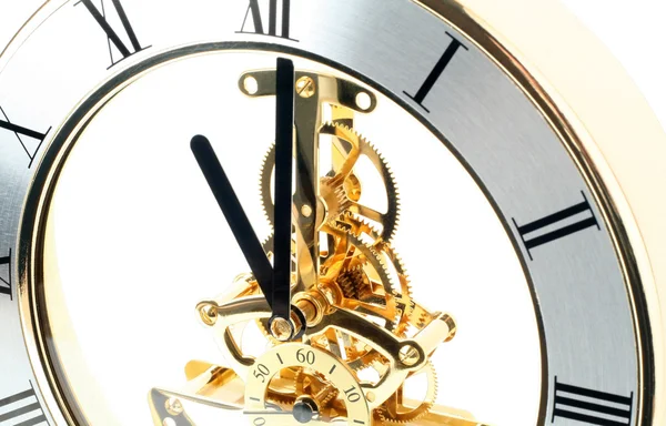 Reloj de mesa de oro sobre fondo blanco — Foto de Stock