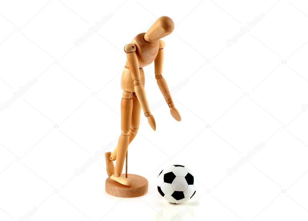 A wooden model is football on a white background