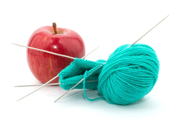 Knitting and apple — Stock Photo, Image